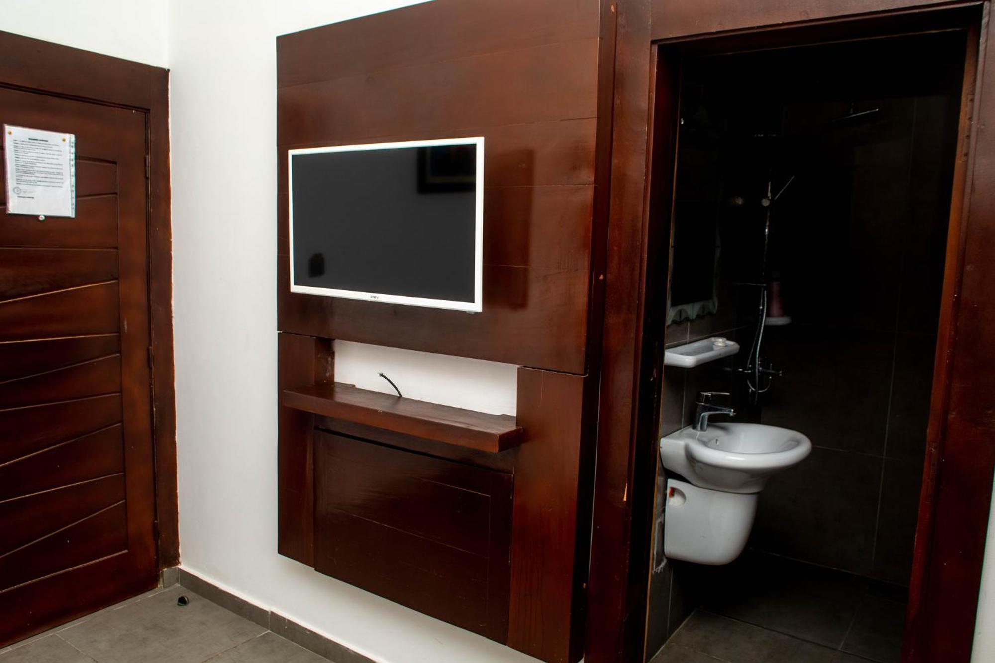 Hotel Les Orchidees Cotonou Quarto foto