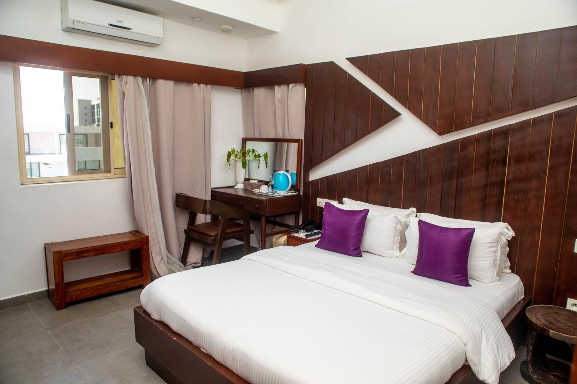Hotel Les Orchidees Cotonou Quarto foto