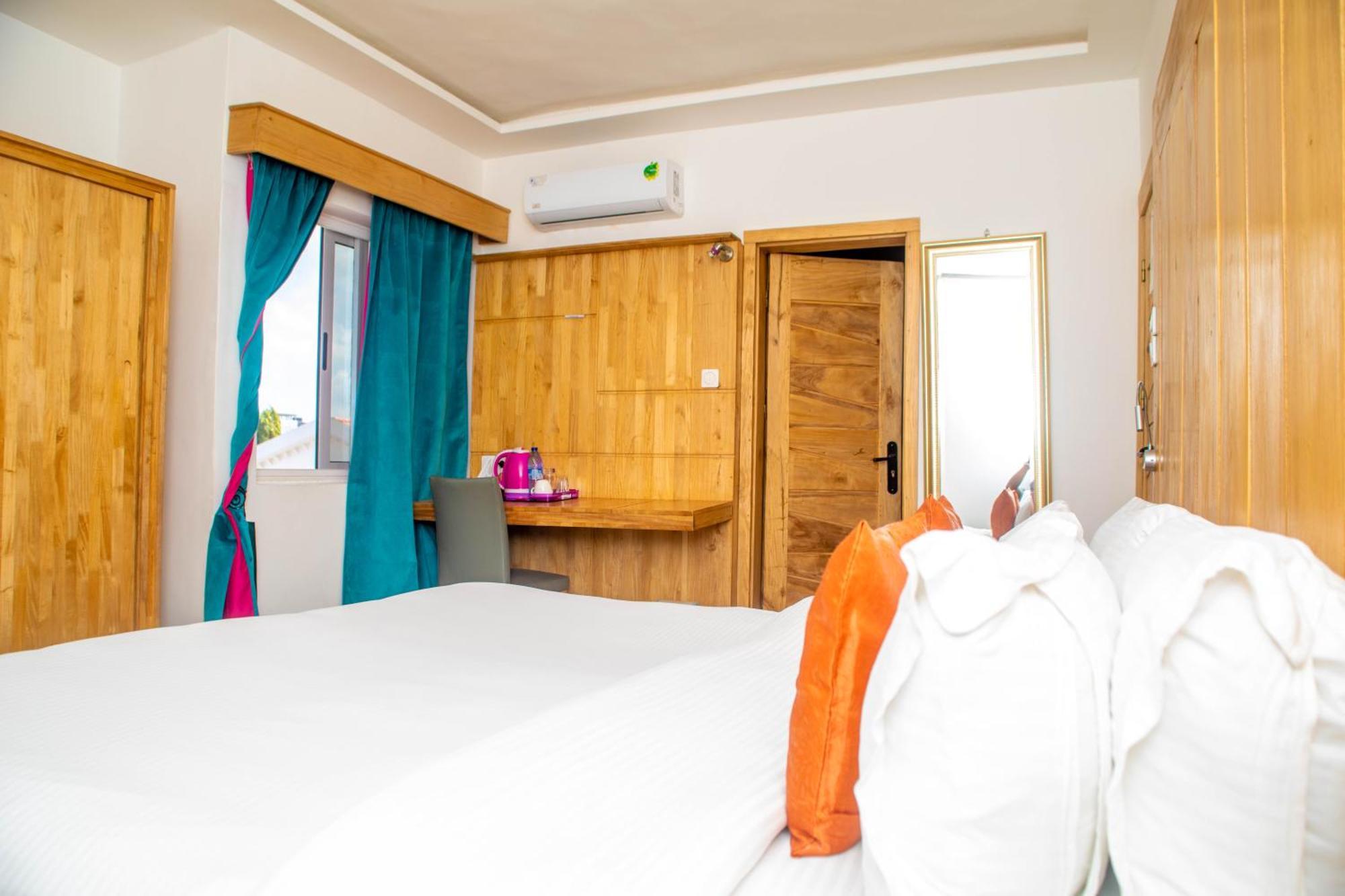 Hotel Les Orchidees Cotonou Quarto foto