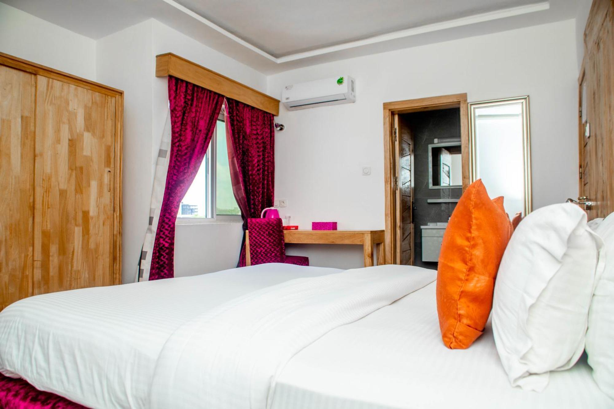 Hotel Les Orchidees Cotonou Quarto foto